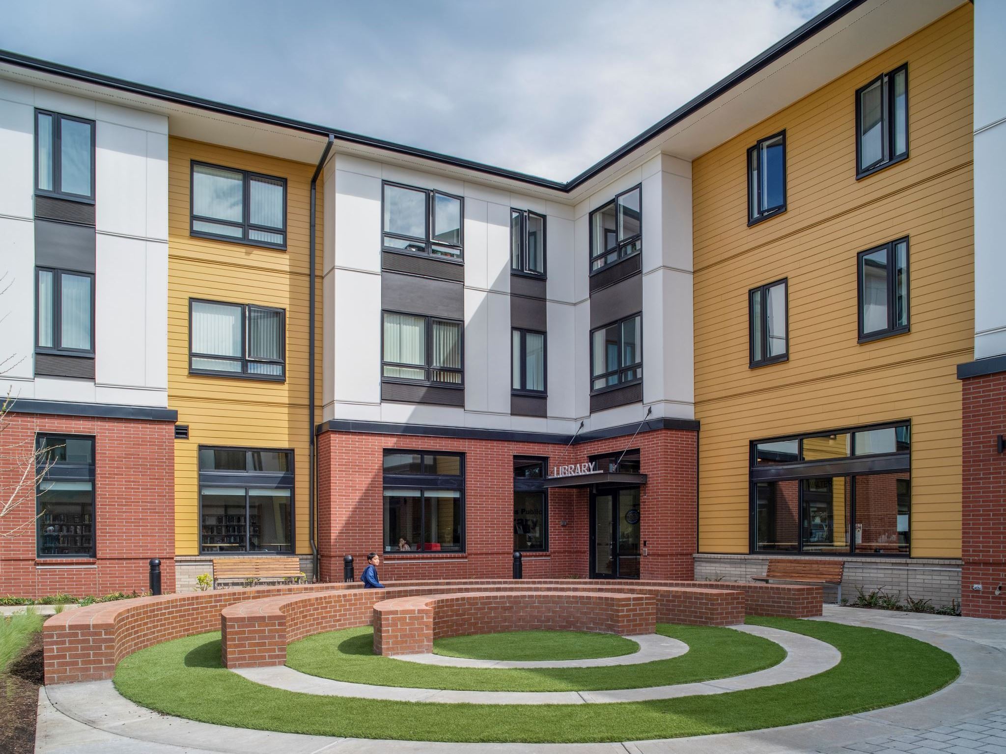 Child Playing in Courtyard of Cornelius Public Library