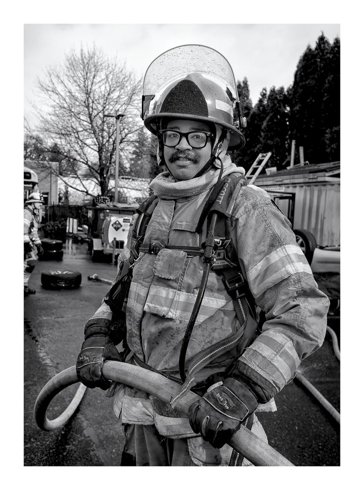 Firefighter Holding Hose