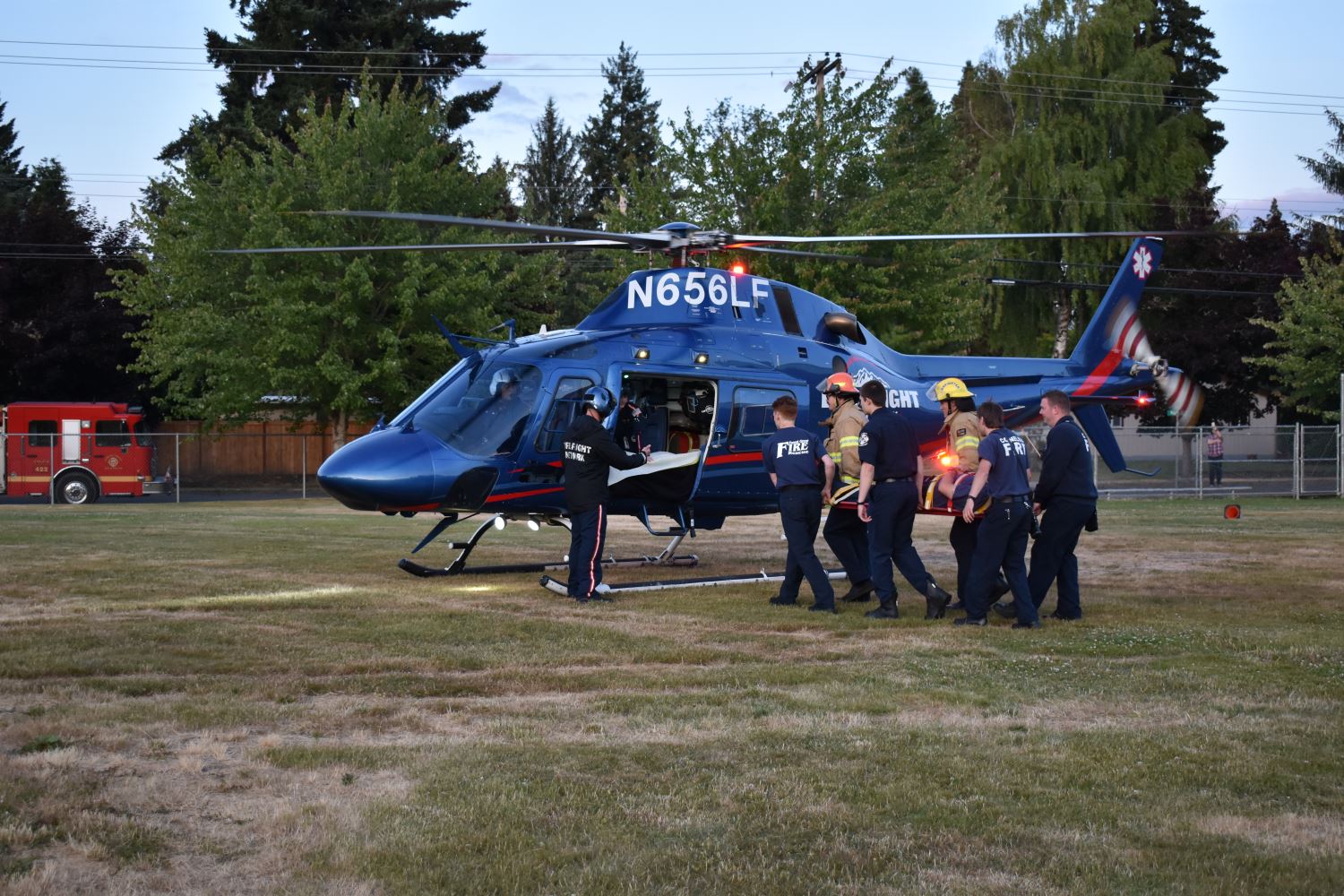 Firefighters getting into Helicopter