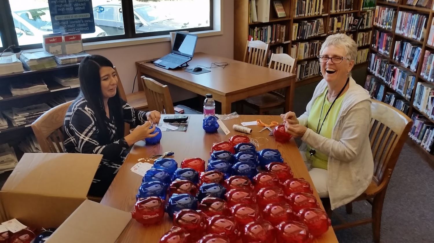 Staff Preparing for a Piggy Banks for a Fundraiser