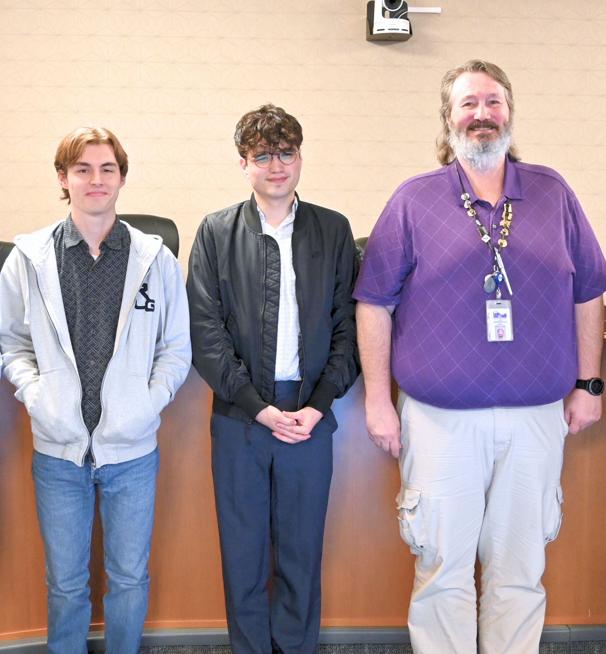 Commissions Owens and Baker pose with Mayor Dalin after being appointed by the City Council.